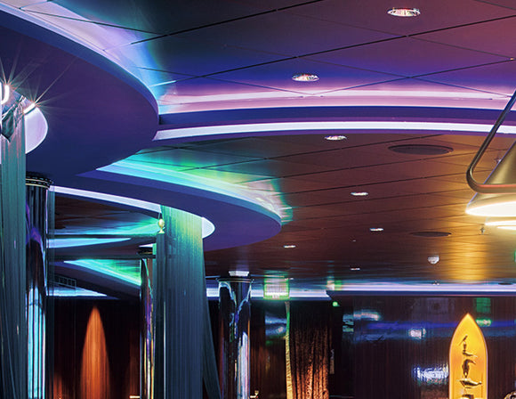A club is decorated with RGB SPI LED strip lights that are powered by a dimmable low voltage transformer.
