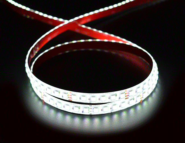 Super Bright Series 24VDC wet rated IP65 low voltage RGB LED strip lights are lit up to demonstrate the range of color. This low voltage RGB LED light strip has many commercial lighting design uses and can be surface mounted or recessed and features LED dimming capabilities.