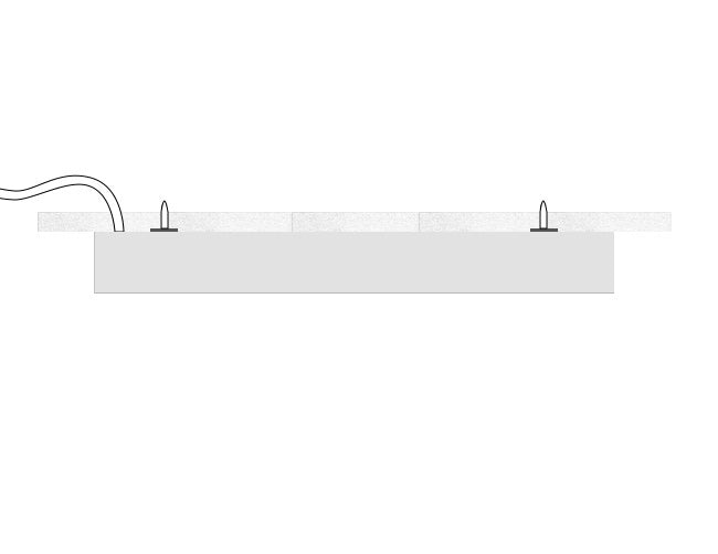 Side view of GL LED L8456 linear light fixture with surface mount kit installed.