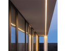 LED WINT Side Bend neon lights are used in an aluminum channel to illuminate an outdoor hallway.